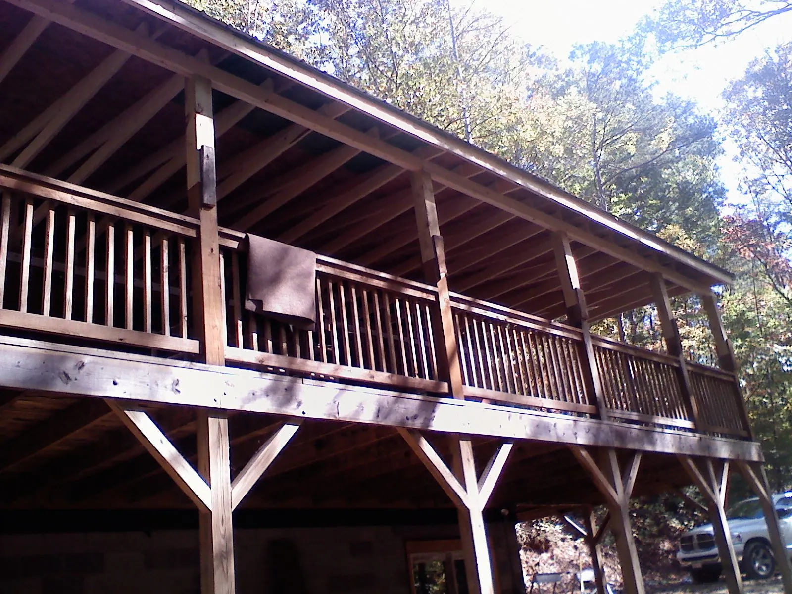 Timber framing under a new elevated porch and deck in Berkshire